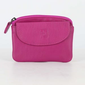 May include: A vibrant magenta leather coin purse featuring a top zipper closure and a front flap pocket with a snap button. The front flap displays a small embossed square logo. The compact accessory has rounded corners and a smooth, matte finish.