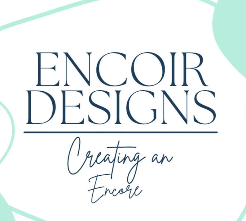 May include: A logo for a design company called Encoir Designs. The logo is in a dark blue color and features the text "Encoir Designs" in a bold, sans-serif font. Below the text is the phrase "Creating an Encore" in a cursive font.