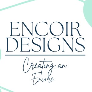 May include: White background with the text "ENCOIR DESIGNS" in a dark blue, elegant font. Below the text is a horizontal line, and beneath that, the words "Creating an Encore" in a cursive font. Light teal shapes are in the background.