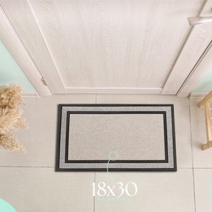 May include: A gray doormat with a black border and a white inner border. The doormat is 18 inches by 30 inches. The text "Encoir Designs" and "Creating an Encoir" is visible in the bottom right corner of the image.