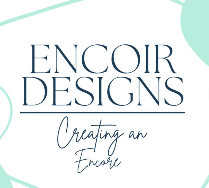 May include: A logo for a design company called Encoir Designs. The logo is in a dark blue colour and the text says "Encoir Designs" with the tagline "Creating an Encore" underneath.