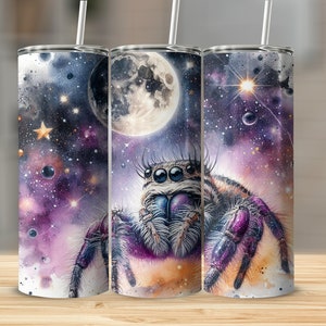 May include: Three stainless steel tumblers with a galaxy-themed design featuring a jumping spider with purple legs and a moon in the background.