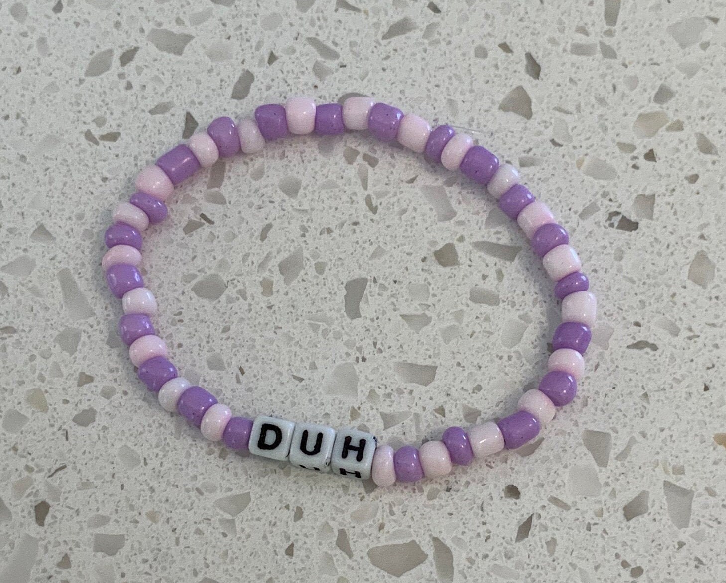 Pink and shop purple bracelets
