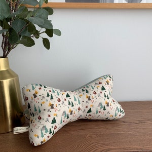 Huesos de lectura/almohada para el cuello