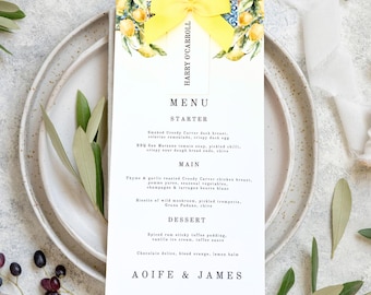 Menú de boda italiano con limón y tarjeta de lugar con lazo amarillo