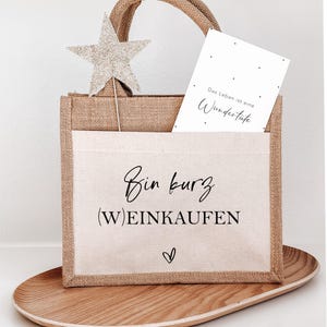 kleine Geschenktasche aus Jute mit Einsteckfach mit Aufdruck "Bin kurz (Wein)kaufen "