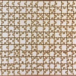 May include: A white wooden jigsaw puzzle with 625 pieces. The puzzle is assembled and shows the outline of each piece.