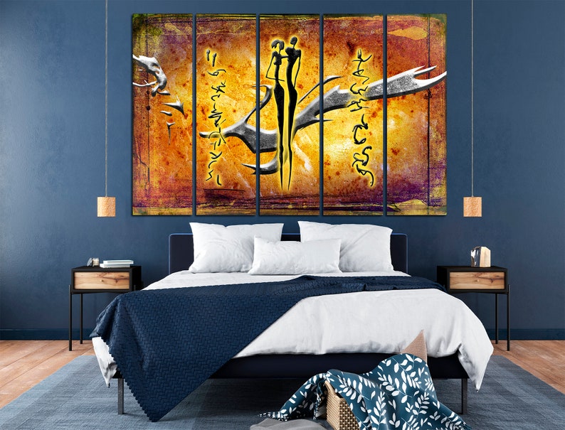 May include: A multi-panel canvas print featuring an abstract design of two figures in black silhouette against a yellow and orange background. The figures are standing close together, with one arm around the other. The background is textured and has a distressed look. The text "Just Breathe" is written in a stylized font on the canvas.