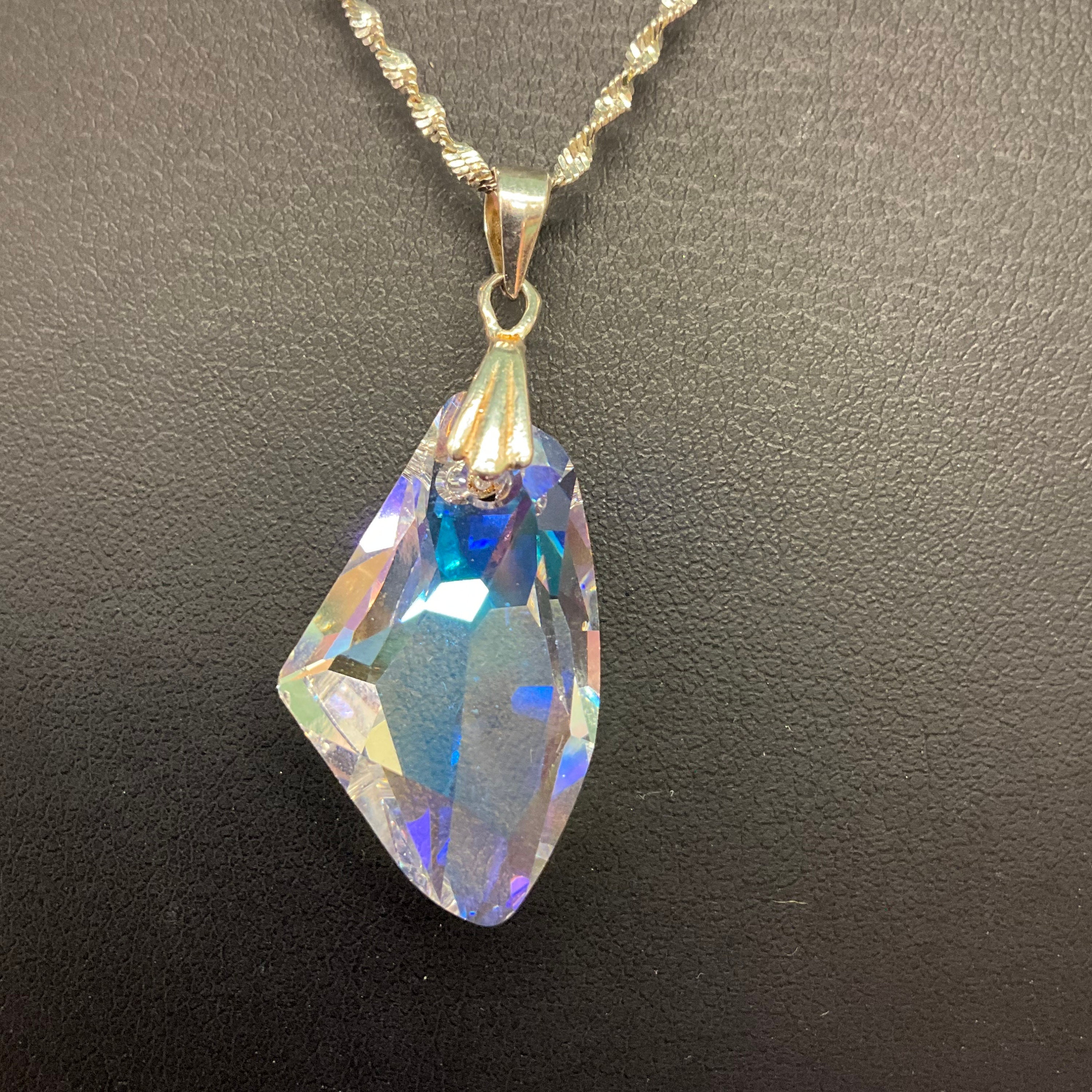 Orecchini pendenti con cristalli Swarovski turchesi Rivoli e acciai... | su