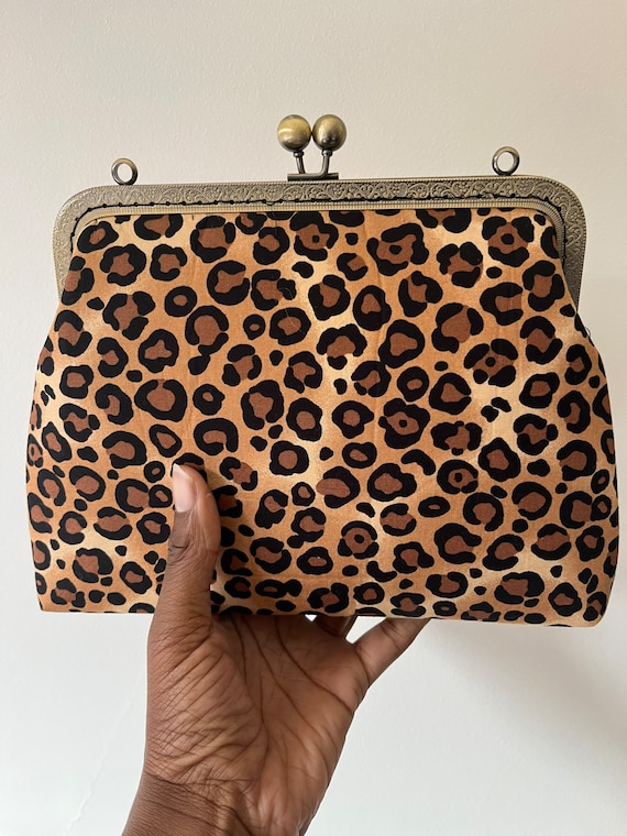 Leopard clutch purse sales