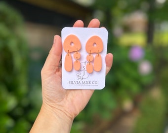 Jordyn in tangerine clay dangles | funky shapes | polymer clay earrings | Hypoallergenic | handmade accessories | light weight