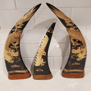 Hand carved buffalo horn lot.