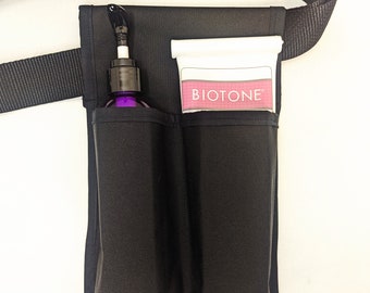 Loción doble y funda multiusos para masajista de raza negra