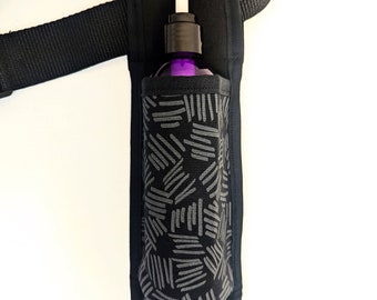 Loción individual para terapeuta de masaje negro y gris y funda de utilidad