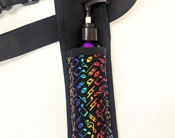 Rainbow Metallic Music Notes Masaje Terapeuta Loción individual y funda de utilidad