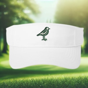 May include: White visor with a green embroidered bird design. The bird is perched on a small stand. The visor is made of a soft, breathable material, perfect for outdoor activities.