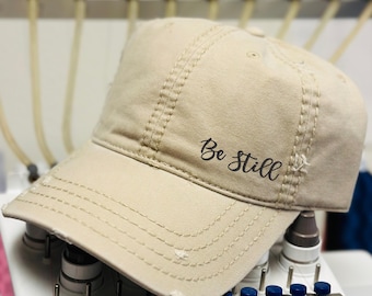 Distressed Christian Cap: "Be Still" Embroidered Bible Verse Hat