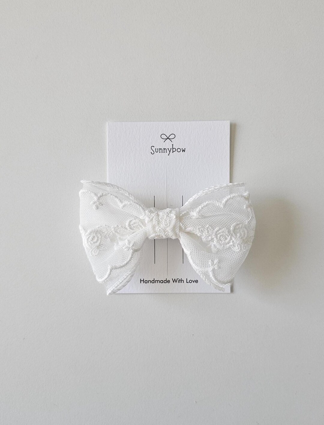 Babyhug Bow and Butterfly Clips Set of 4 - White & Pink
