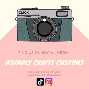 May include: A vintage camera with a cracked, blue and gray finish. The camera has a lens with the text "46mm 1:7.6" and the word "CLICK" on the top. The camera is on a pink background with the text "FIND US ON SOCIAL MEDIA! @SIMPLY CRAFTY CUSTOMS Share your photos with us by using #SimplyCraftyCustoms" and icons for TikTok and Instagram.