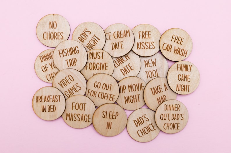 May include: Wooden tokens with various phrases written on them, such as "No Chores", "Free Kisses", "Breakfast in Bed", and "Family Game Night".