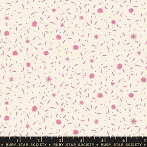 May include: Cream-colored fabric with a repeating pattern of pink starbursts, dots, and dashes. The fabric has a playful, whimsical design, suitable for quilting or crafting projects. The text "RUBY STAR SOCIETY" is at the bottom.
