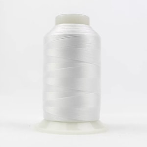May include: A spool of white thread for sewing or embroidery.