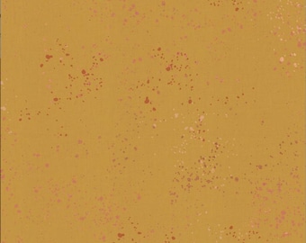 May include: Mustard-colored fabric with a speckled pattern in shades of pink and white. The fabric has a textured appearance, with small, irregular spots scattered across the surface. The text "RUBY STAR SOCIETY" is printed at the bottom.