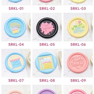 May include: Twelve different wax seal stamps with birthday themes. The stamps are round and feature various designs, including cakes, balloons, and the words "Happy Birthday".