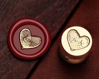 May include: A red wax seal with a gold heart-shaped impression that reads "Love". A gold heart-shaped wax seal with a gold heart-shaped impression that reads "Love" is also shown.