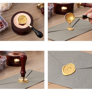 May include: A set of wax seal supplies including a wooden base with a metal pot for melting wax, a wooden handle spoon for scooping wax, a wooden handle stamp with a gold metal design, and a gold wax seal on a gray envelope.