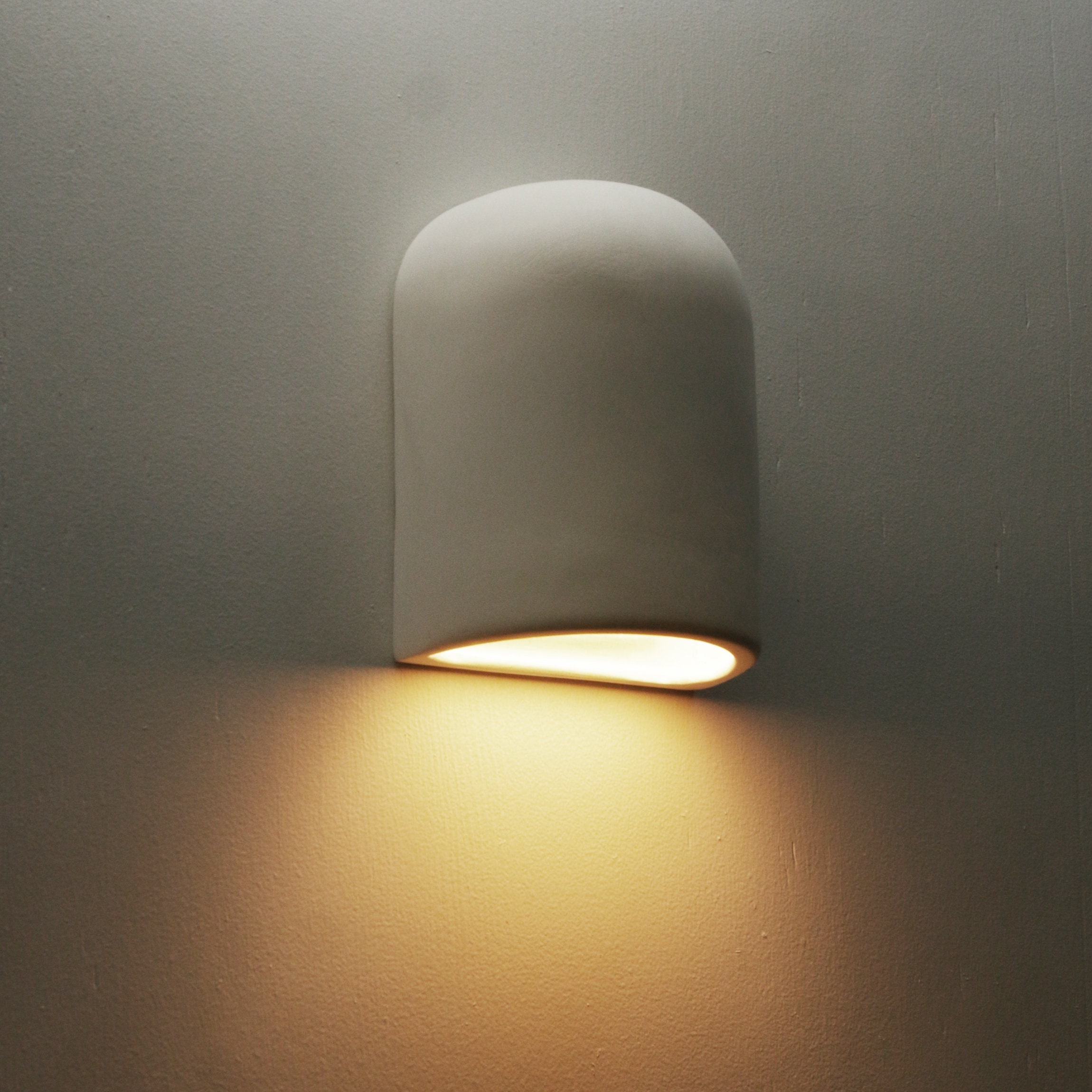 Half dome clearance wall sconce