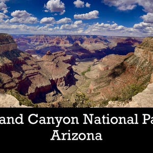 May include: Panoramic view of the Grand Canyon National Park in Arizona. The image showcases the vast canyon with layers of red and brown rock formations under a blue sky dotted with fluffy white clouds. Text at the bottom reads "Grand Canyon National Park Arizona."