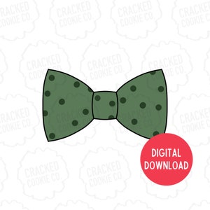 Könnte beinhalten: Eine grüne Fliege mit schwarzen Punkten. Die Fliege ist schwarz umrandet.