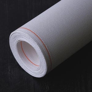 May include: A tightly rolled bolt of white Aida cloth featuring a distinct, thin orange guide line running along the edge of the fabric. The material displays a clear, uniform grid pattern characteristic of cross-stitch or embroidery canvas fabric.