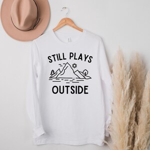Still Plays Outside Shirt Hiking Shirt Take a Hike Shirt Hiking Gifts Hiker Shirt Nature Shirt Trendy Shirt Gift for a hiker Mountains shirt