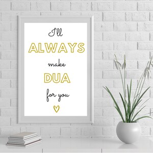 May include: White framed print with black text that reads "I'll ALWAYS make DUA for you" with a gold outline around the word "ALWAYS" and "DUA". A small heart is at the bottom of the text.