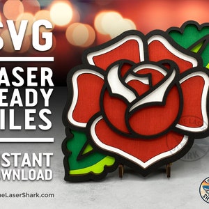 May include: Red, white, and green layered rose with a black outline. The rose is on a stand and has a green leaf. The image has the text "SVG LASER READY FILES INSTANT DOWNLOAD TheLaserShark.com" on the left side.