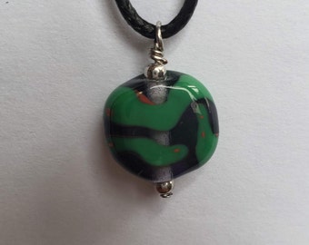 Purple and Green Lampwork Pendent on a Cotton Cord