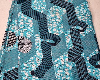 May include: A blue and black patterned fabric with a geometric design. The fabric features a repeating pattern of squares, diamonds, and circles.