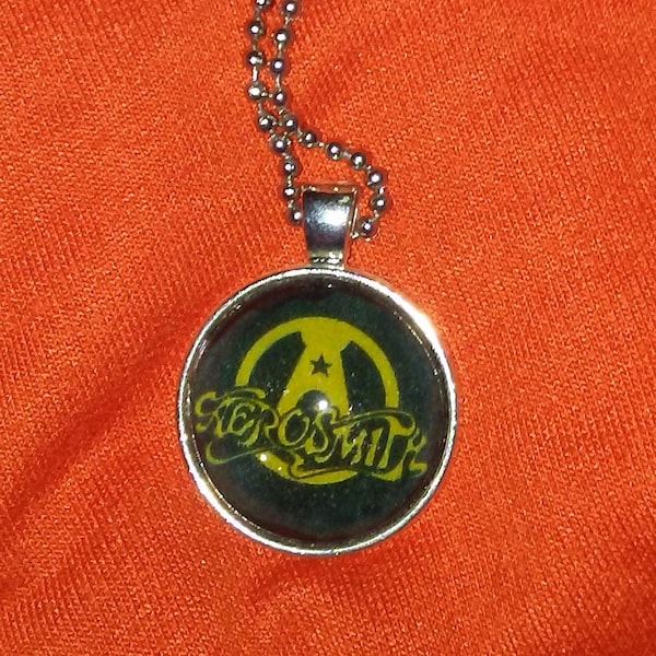 1 inch Aerosmith rock and roll band pendant on 24 inch nickel plated ball chain necklace;  Jewelry