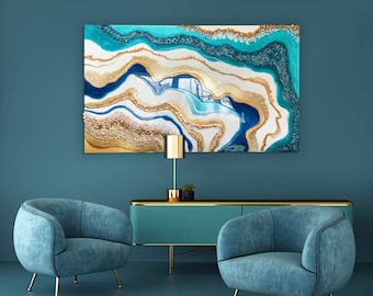 May include: A teal blue and gold abstract resin art piece hangs on a teal blue wall above a teal blue cabinet with gold accents. Two teal blue armchairs with gold legs are in front of the cabinet.