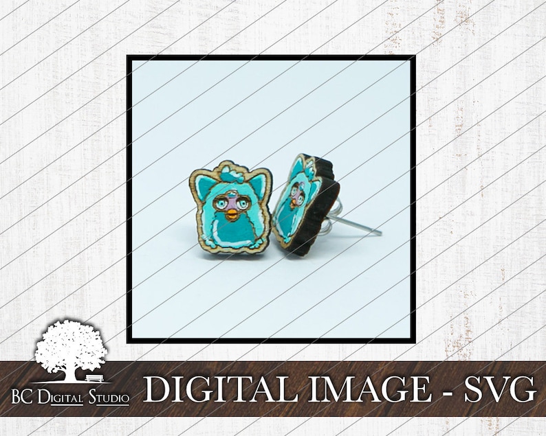 May include: A pair of teal blue wooden earrings featuring a cartoon character with a pink nose and blue eyes. The earrings are shaped like a square and have a silver post.