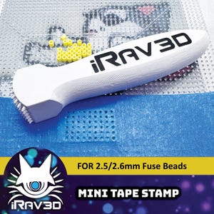 May include: White iRAV3D Mini Tape Stamp for 2.5/2.6mm fuse beads. The stamp has a rectangular head with bristles and a rounded handle with the text "iRAV3D" in black. The background is blue and white with yellow fuse beads.