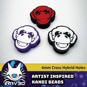 May include: Three monkey face kandi beads with 4mm cross hybrid holes. The beads are purple, black, and red with white monkey faces.