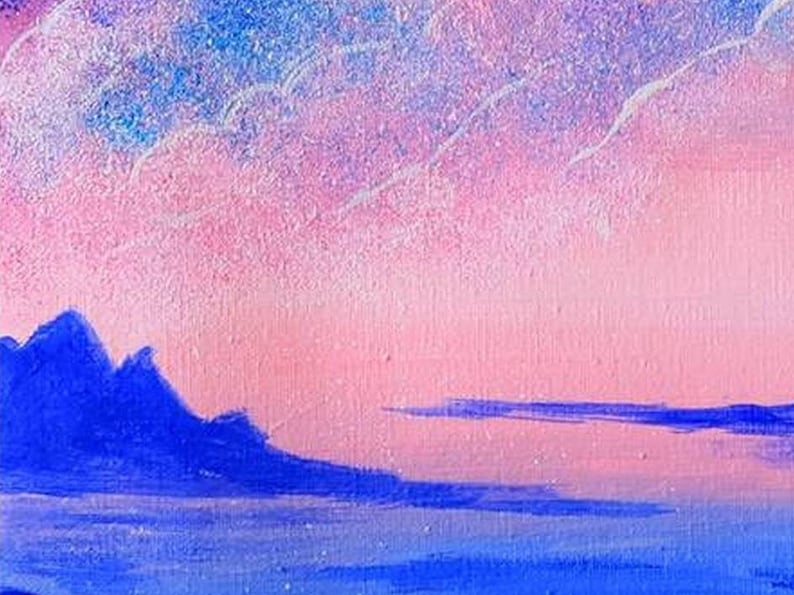 May include: A painting of a pink and blue sunset over a dark blue mountain range. The sky is filled with white clouds and the water is a light blue.