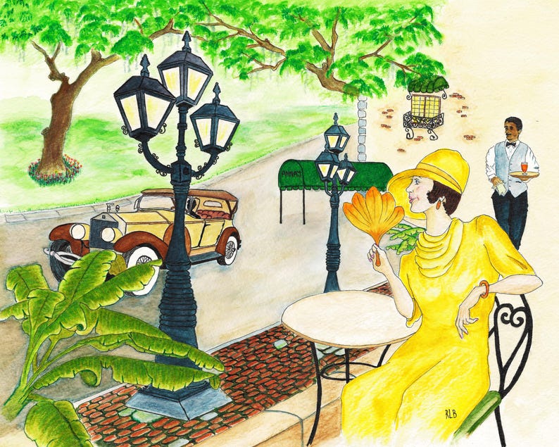 May include: Watercolor painting of a woman in a yellow dress and hat, holding a fan, seated at a cafe table. A waiter approaches with a tray. A vintage car and street lamps are in the background, with lush greenery and a brick-paved sidewalk.