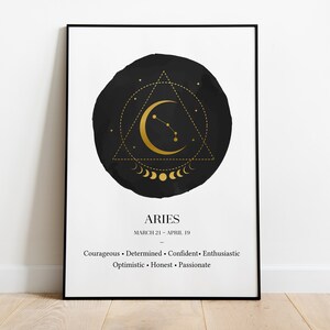 May include: A black and gold minimalist poster with the zodiac sign Aries. The poster features a crescent moon with stars, a triangle, and a circle of moons. The text "ARIES" is at the bottom of the poster, along with the dates "MARCH 21 - APRIL 19". The text "Courageous. Determined. Confident. Enthusiastic. Optimistic. Honest. Passionate." is also included.