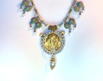 Handmade Angel fairy necklace with vintage bits. Fantasy, pearls, brass, silver