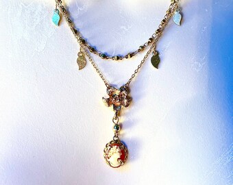 Handmade floral, leaves, cameo, gold, and brass vintage style necklace