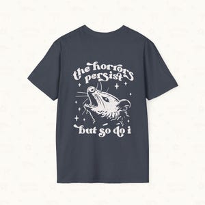Back flat lay of Possum Tee in Heather Navy Blue.